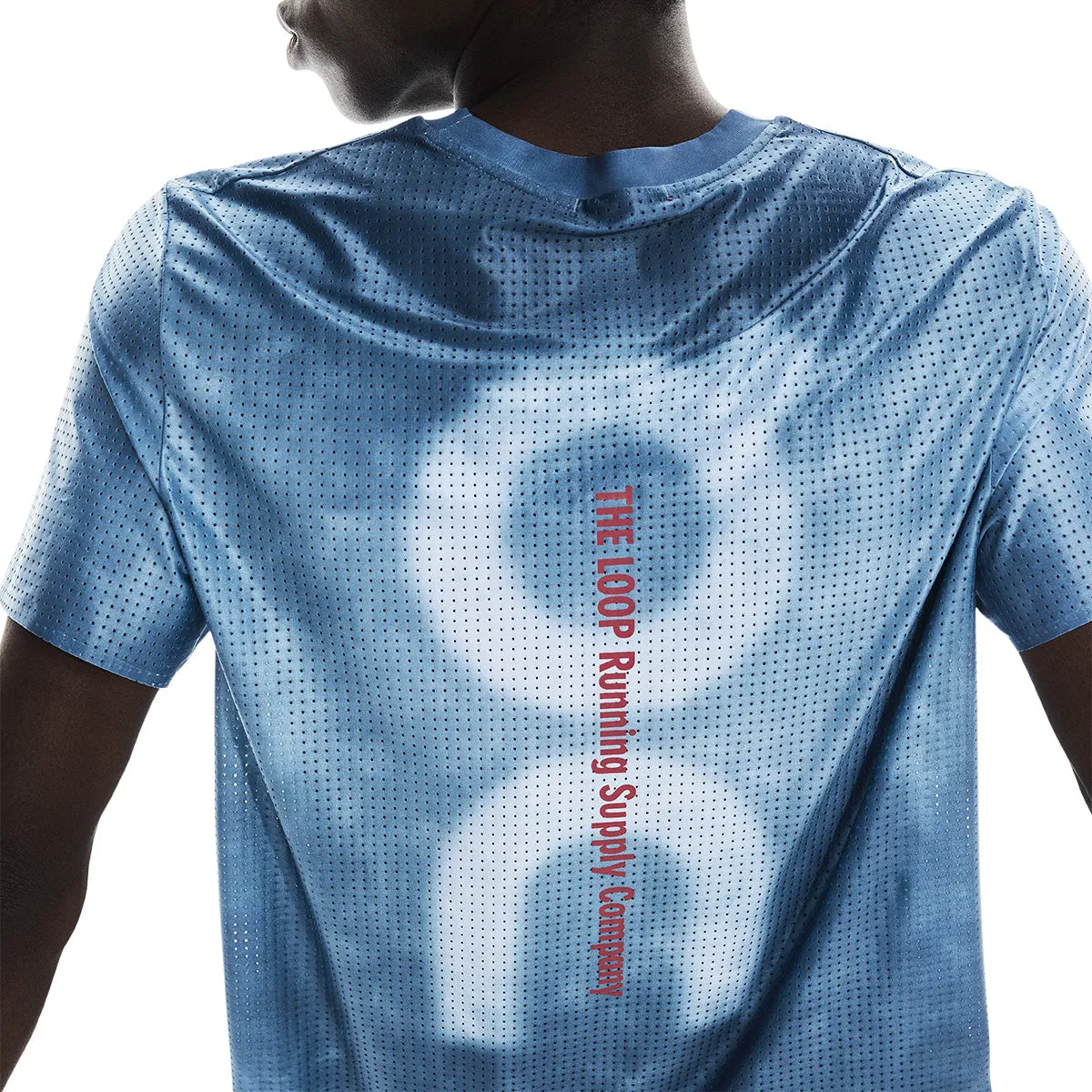   PLEASURES   The LOOP Running Supply Pace Tee 'Nile'